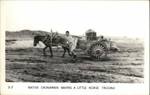 WWII Okinawa Japan Okinawan Man Trouble with Horse Real Photo Vintage Postcard