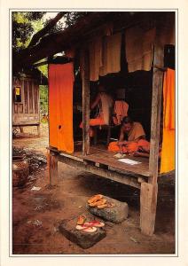 BF1190 buddhist monks in their simple huthi huts study  Thailand