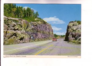 Car on Highway 17 at Kama Rock Cut, Ontario,