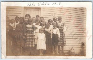 1908 Group Children RPPC Outdoors Fancy Girls Real Photo PC School? A171