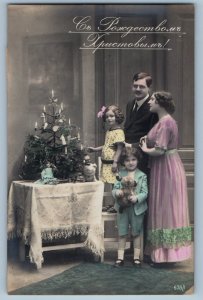 Christmas Postcard RPPC Photo Family Boy With Dog Toy Russia c1910's Antique