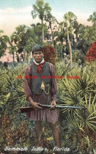 Native American Seminole Indian Holding a Shotgun in Florida, Leighton No 7713