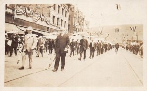 J77/ Missoula Montana RPPC Postcard c1917 Patriotic Parade Men Umbrella 13