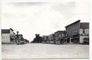 Newberry MI Tom's Department Store Other Store Fronts Old Cars RPPC Postcard