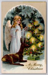 Christmas Greetings Angel Decorating Candlelit Tree As Deer Watches Postcard C39