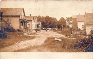 Riley ME Dirt Main Street View Store Fronts RPPC Postcard