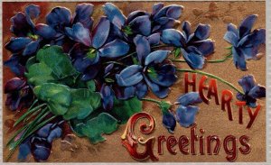 Hearty Greetings - Violets - Embossed - c1909 - Vintage Postcard