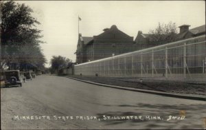 Stillwater MN Prison Fence & Car Street 1934 Used Real Photo Postcard