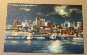 VINTAGE UNUSED LINEN POSTCARD - SKYLINE BY MOONLIGHT, TAMPA, FLORIDA