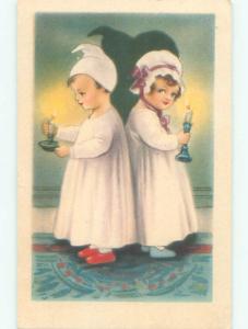 1929 foreign CUTE GIRL BACK TO BACK WITH BOY HOLDING CANDLES k7377