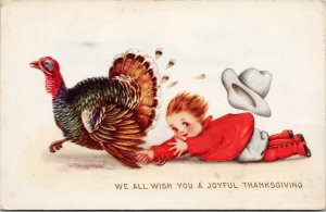 A Joyful Thanksgiving Turkey Dragging Child in Red c1916 Postcard F24