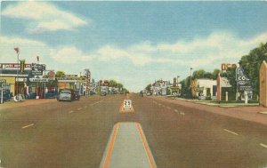 Tucumcari New Mexico Highway US 66 Gas Station pumps Autos Postcard 21-8258