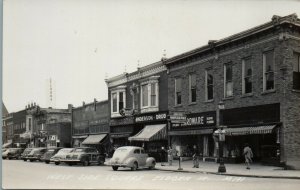 1940s West Side Square Eldora Iowa Rexall Drugs RPPC Real Photo Postcard