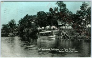 1909 Cedar Falls, IA Summer Cottage & Boat Litho Photo Postcard Cedar River A38