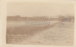 LLANO TX NEW RPPC POSTCARD THE DAM & LLANO RIVER IN FLOOD STAGE w TOWN & BRIDGE