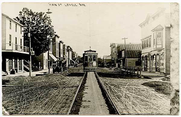 Lowell WI Trolley Dirt Street View Vintage Store Fronts RPPC Real Photo Postcard