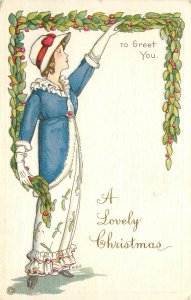 Embossed Christmas Postcard Signed M.E.P. Pretty Girl in Blue w/Garland 416-A