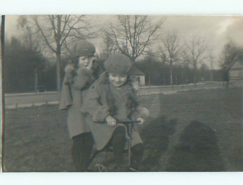 circa 1910 rppc CUTE LITTLE GIRL WITH PIGTAILS RIDING A TRICYCLE o2572 ...