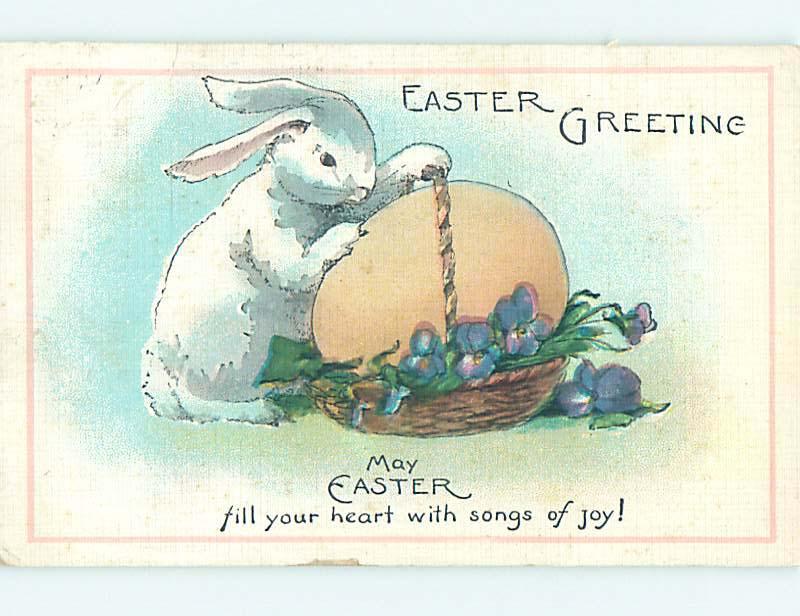 1934 Easter BUNNY RABBIT TRIES TO CARRY GIANT EGG IN BASKET o6107