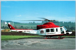 Helicopter Bell (Augusta) 412 HB-XVU (cn 25577) OF Helimission Berne, Postcard