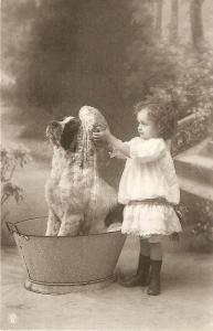 \Little girl bathing her dog\ Lovely vintage postcard