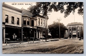 J90/ Juneau Wisconsin RPPC Postcard c1910 Oak Street Stores  249