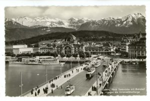 Switzerland - Luzern. Pier & Train Station & Mountains RPPC (curled postcard)