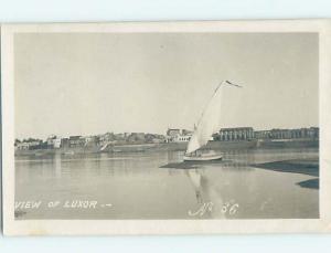 old rppc SAILBOAT BOAT BESIDE BUILDINGS Luxor Egypt HM2126