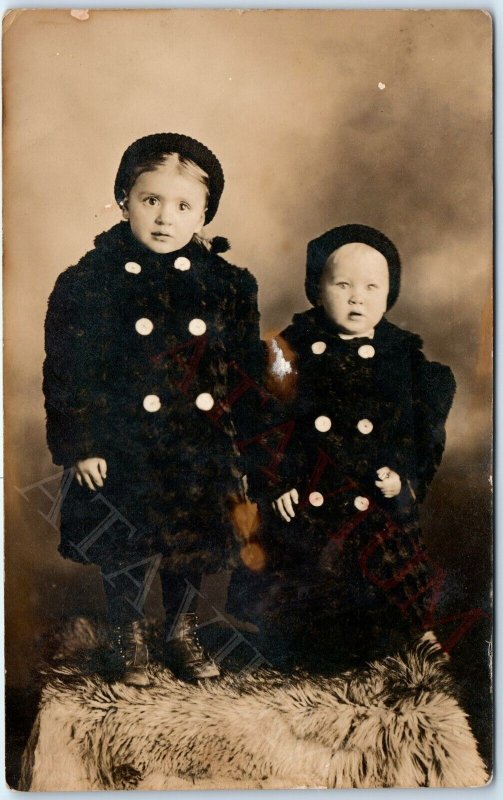 c1910s Adorable Little Boy & Girl RPPC Children Siblings Photo Winter Coats A159