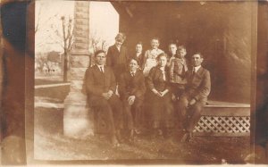 1910s RPPC Real Photo Postcard Family Portrait Men Women Children On Porch