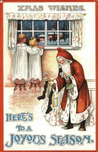 Christmas - Santa Claus Fills Stockings BB LONDON C11 Embossed Postcard