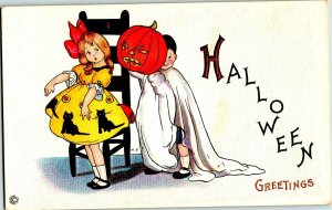 Vintage Stecher Litho Co. Girl &  Boy dressed as JOL Ghost Halloween Postcard