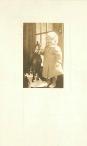 Little Girl Toy riding horse interior RPPC Photo 1927 Postcard 20-1949