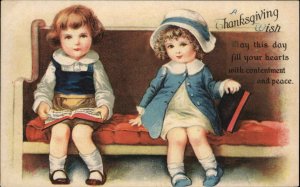 Thanksgiving Kids on Bench With Books Ellen Clapsaddle Wolf 23 Postcard c1915 