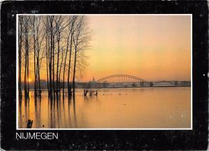 BT9114 Nijmegen hoogwater en zonsondergang     Netherlands