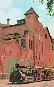 Helena MT Old Brewery Theater With Passenger Train Postcard