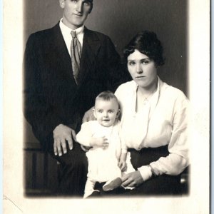 c1910s Young Married Couple & Smiling Baby RPPC Serious Mom Real Photo +Man A160