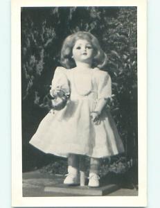 Old rppc ANTIQUE DOLL HOLDING LITTLE BASKET r6569