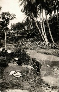 PC CPA JAVA washing clothes in the ricer INDONESIA (a14956)