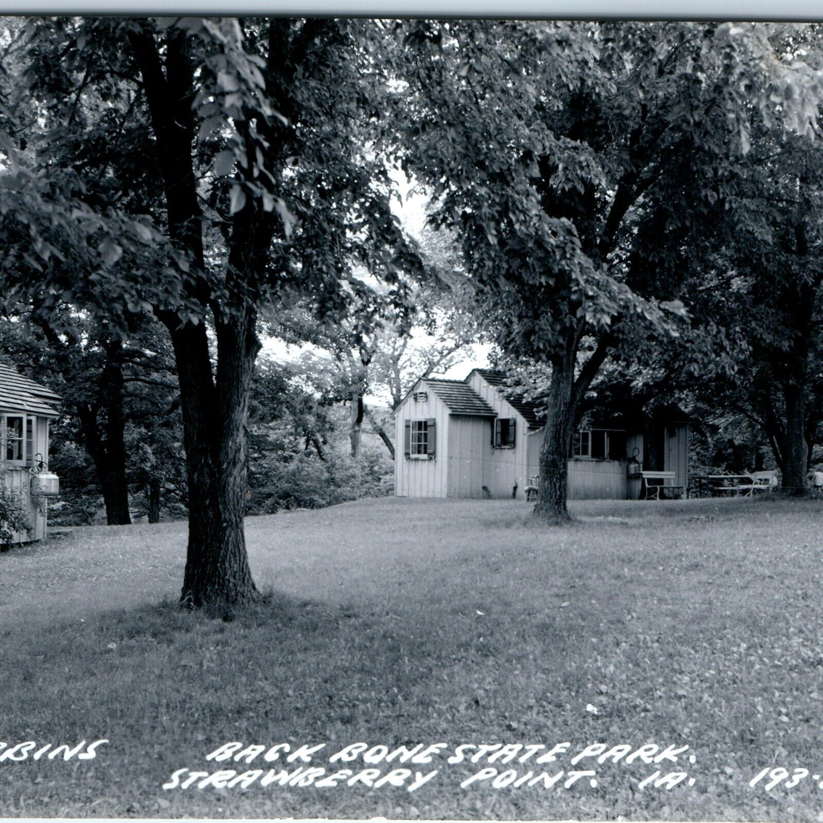 c1950s Strawberry Point, IA RPPC Backbone State Park Cabins Camp Real