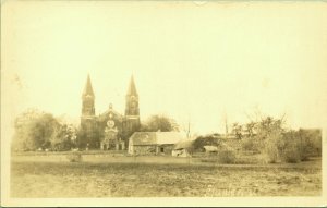 RPPC Siaulenai near Šiauliai Lithuania Church and Buildings Real Photo Postcard