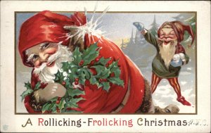 Christmas Santa Claus Jester Snowball Fight Embossed Stecher c1900s-10s Postcard