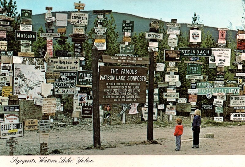 CONTINENTAL SIZE POSTCARD THE FAMOUS WATSON LAKE YUKON SIGNPOSTS