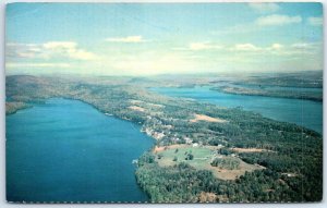 Postcard - Belgrade Lakes, Maine with Hotel & Village in Foreground, USA