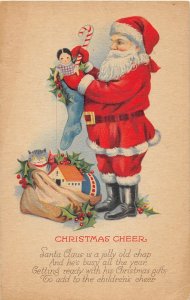 F98/ Santa Claus Christmas Postcard c1910 Cat Toy Sack Candy Cane 9