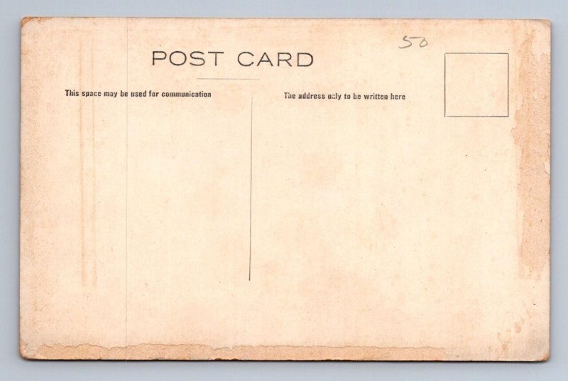 THE WHITE SLAVE WOMEN'S SUFFRAGE SEWING MACHINE POSTCARD (1909)