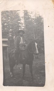 J52/ Interesting RPPC Postcard c1910 Cowboy on Horse Native American? 208