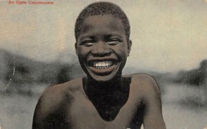 AN OPEN COUNTENANCE BLACK AMERICANA POSTCARD (c. 1910)