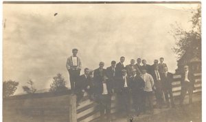 RPPC Postcard Young Men Hanging Out on Fence 1909