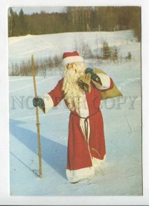 429428 ESTONIA New Year SANTA with gifts 1994 year RPPC advertising label